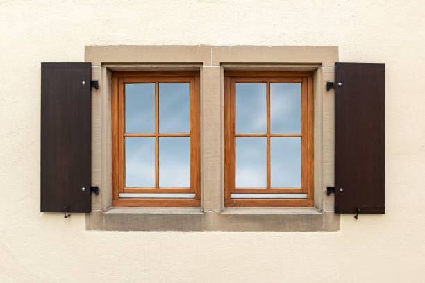 istock Vintage windows with wooden shutters 1257847520