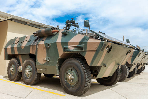 Army armored cars Three armored cars parked side by side armored truck stock pictures, royalty-free photos & images