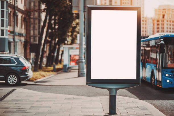 Empty ad poster mockup near highway