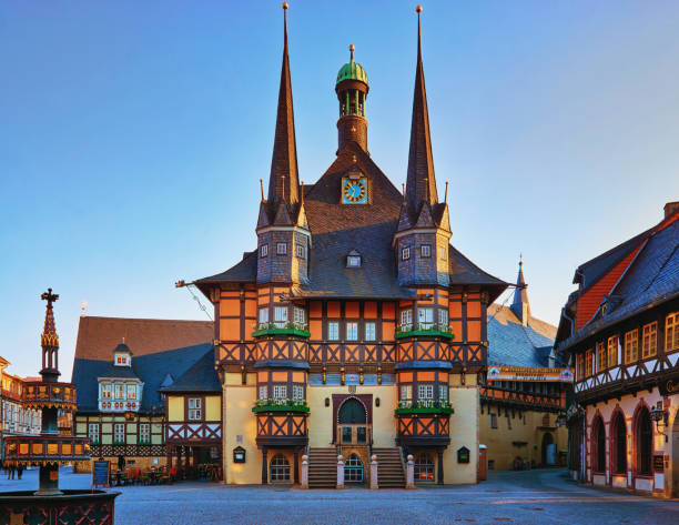 Wernigerode, Germany - April 16, 2019: Old historic half-timbered house in the evening sun in Wernigerode. Germany