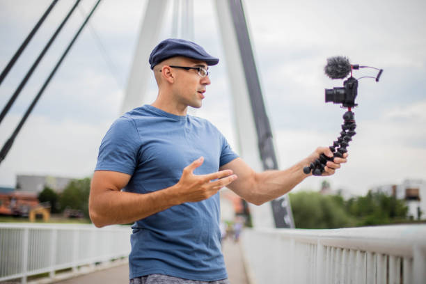 istock Vlogger is recording his new vlog 1257856902