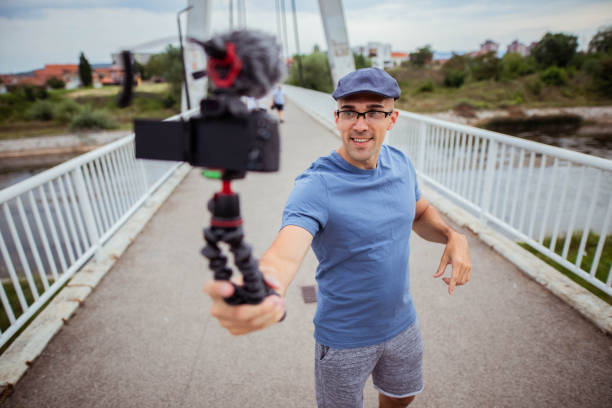 istock Vlogger is recording his new vlog 1257856904