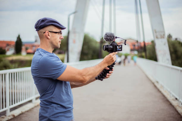 istock Vlogger is recording his new vlog 1257856908