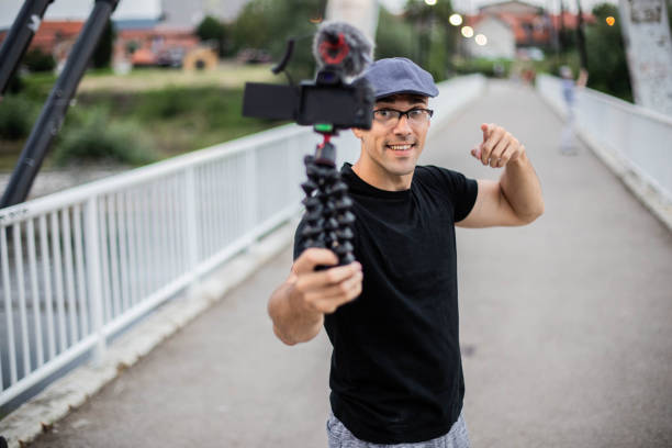 istock Vlogger is recording his new vlog 1257856912