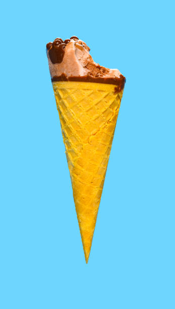istock side view fresh chocolate flavor ice cream cone with a bite on a blue background 1257861809