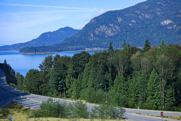 istock Scenic coastal highway in British Columbia with mountains 1257864902