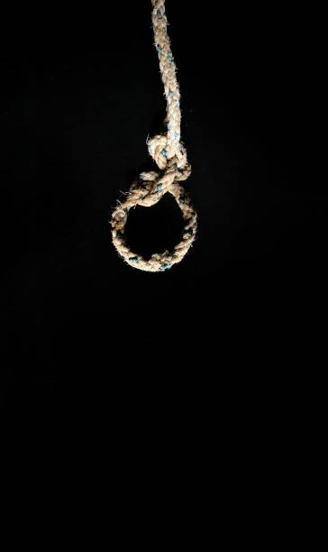 istock Rope knot on black background. decorative concept 1257878772