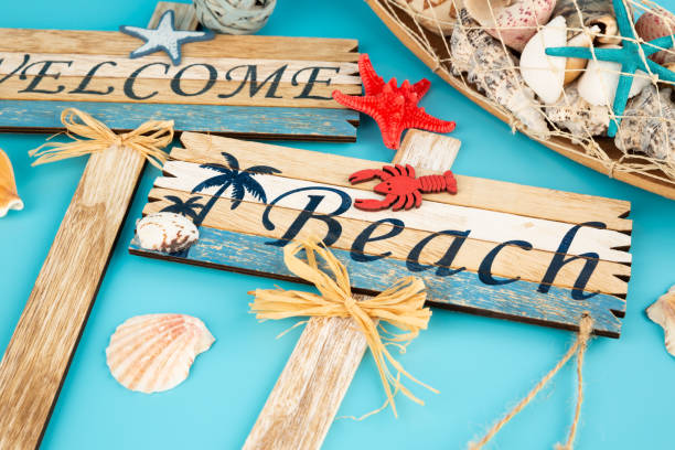 istock Wooden signs welcome beach 1257894420