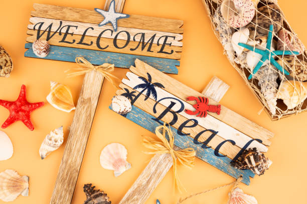 istock Wooden signs welcome beach 1257894514