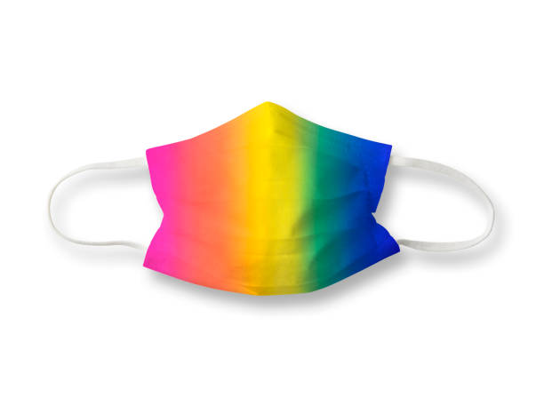 istock Isolated shot of rainbow protective face mask on white background. 1257894560