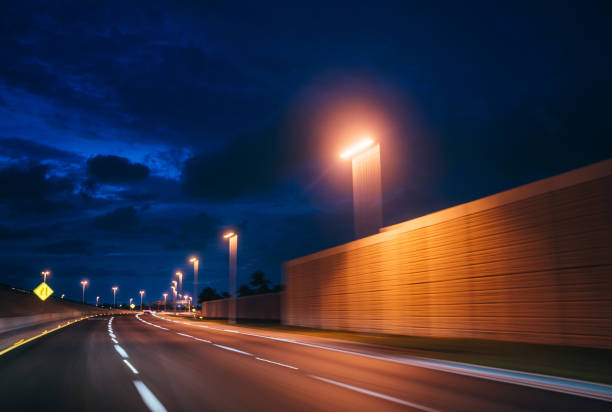 istock The road less travelled at night 1257896112
