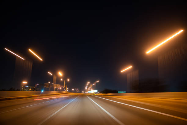 istock Speeding on the motorway at night 1257896162