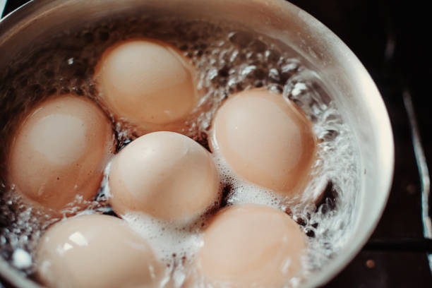istock Eggs are boiling with high temperature. Cooking chicken eggs in pot. Boiled eggs. 1257899097