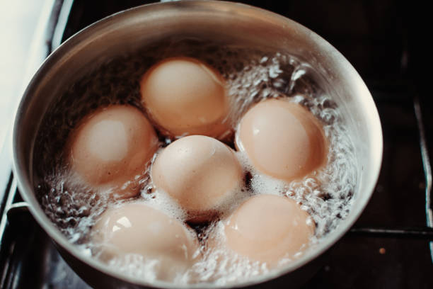 istock Eggs are boiling with high temperature. Cooking chicken eggs in pot. Boiled eggs. 1257899809