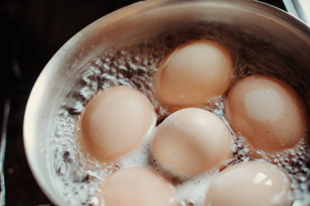 istock Eggs are boiling with high temperature. Cooking chicken eggs in pot. Boiled eggs. 1257900135