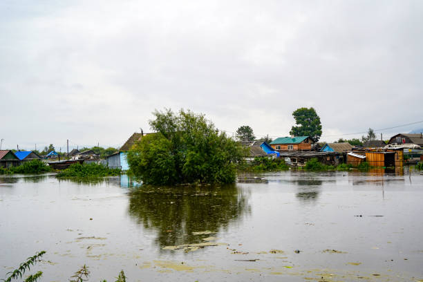 istock flood in the village in summer, spring 1257905046