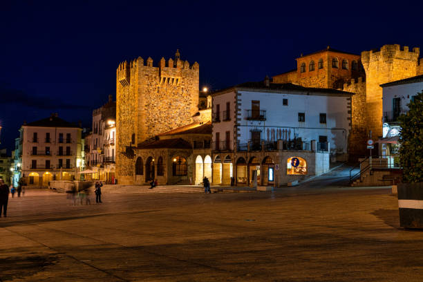Caceres, Spain - November 08, 2019: Bujaco Tower, Torre de Bujaco at night in Caceres Main Square, Extremadura, Spain The most important tower and one of the symbols of the city.