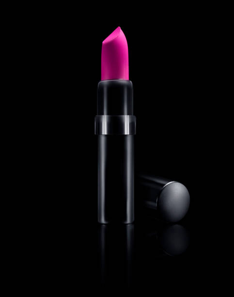 istock Pink Lipstick Isolated on Black 1257909028