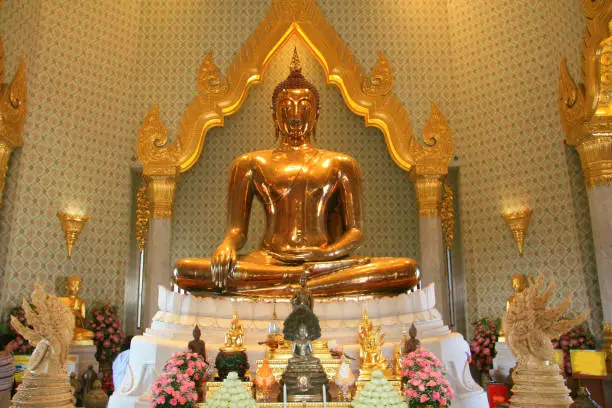 Photo of Gold Buddha sculpture at Wat Trimitr