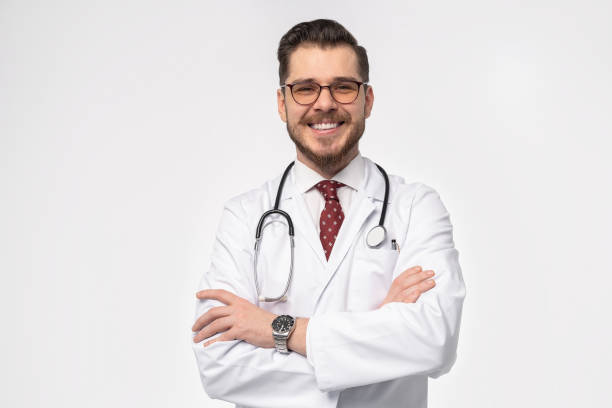 istock Smiling medical doctor. Isolated over white background. 1257911346