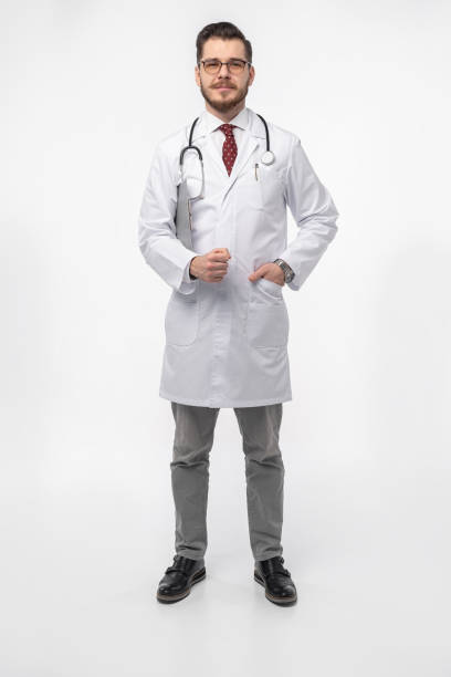 istock Smiling medical doctor. Isolated over white background. 1257911370