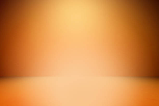 istock Orange bright painted concrete texture  Abstract Grunge Decorative Stucco wall background for the designer, Gold background yellow color light corner spotlight faint orange vintage background, Colorfu 1257912658