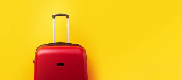 istock red travel suitcase 1257917566