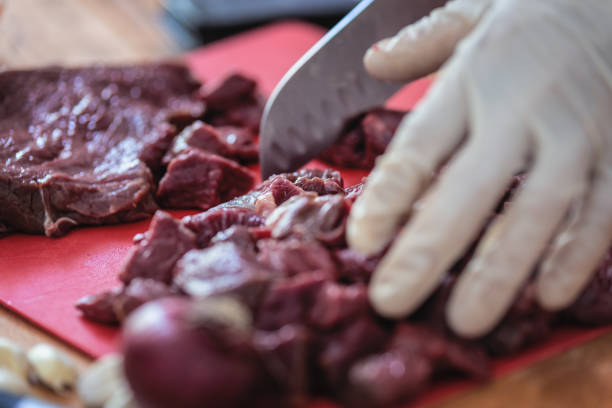 istock Game animal meat cut on cutting board, close up, selective focus 1257925916