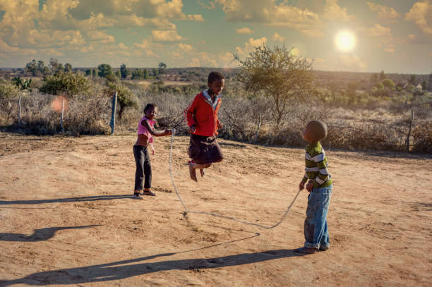 istock African girls and boy  group skipping rope 1257926936