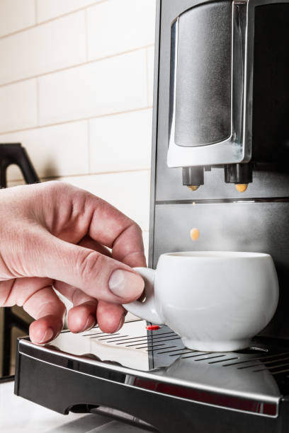 istock woman's hand takes a ceramic Cup of coffee Prepared 1257931355