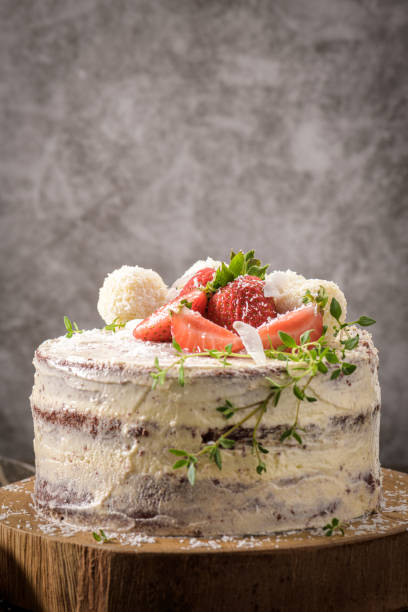 istock Naked cake with strawberries 1257932559