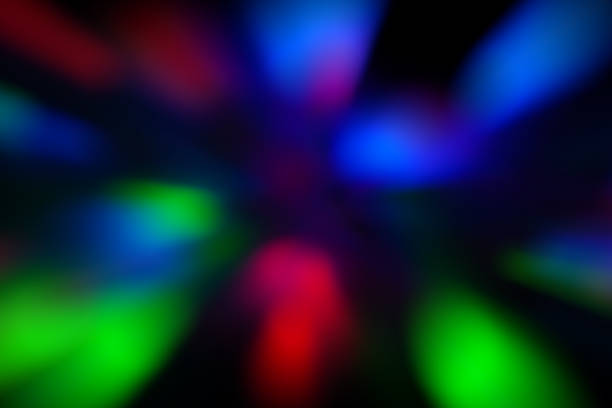 istock Blurred lights dark blue, red, pink, green background. Abstract soft explosion effect. Centric motion pattern 1257939598