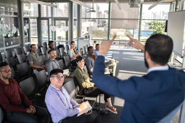 istock Businessman doing a presentation to a team 1257943046