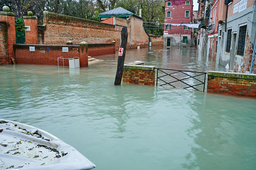 The city square called Rio Tera Del Forner completely flooded during high tide (Acqua Alta). Castello District. Venice. Italy.