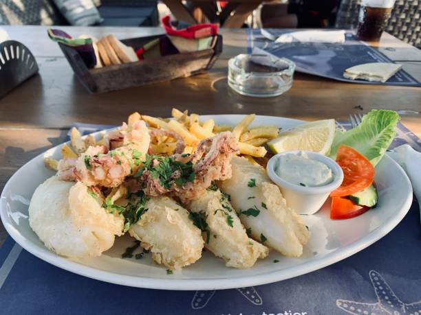 istock Fried squid on the plate on the table 1257945753