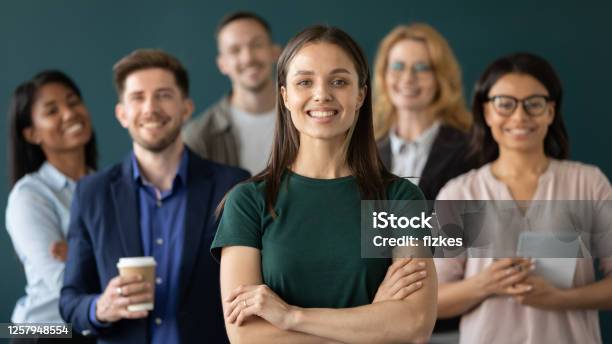 Close Up Headshot Portrait Of Happy Businesswoman Hands Crossed Posture Stock Photo - Download Image Now