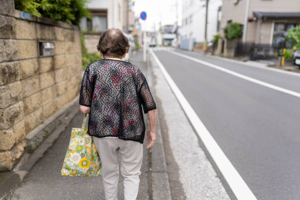 Japanese senior woman going for shopping.