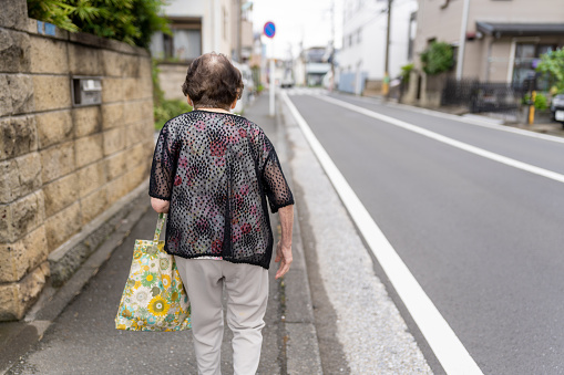 Japanese senior woman going for shopping.