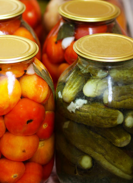 istock We preserve tomatoes and cucumbers for the winter. 1257951059