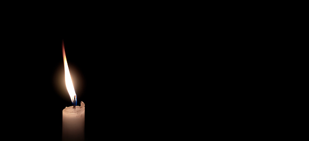 Closeup Image Of Beautiful Candle Light In Dark Background