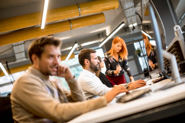 istock Young professional businessman uses a computer for work in the office 1257954186