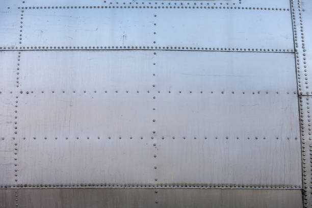 istock Old Aircraft Metal Covering tiles Texture 1257954930