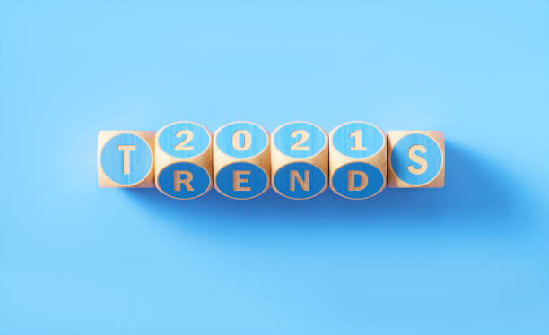 istock 2021 Trends Written Blue Wood Blocks Sitting on Blue Background 1257955352