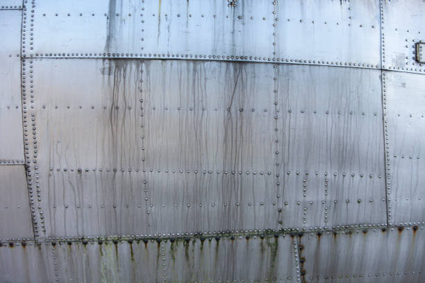 istock Old Aircraft Metal Covering tiles Texture 1257956532