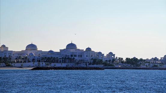 Panoramic view on white marble palace in sunny day