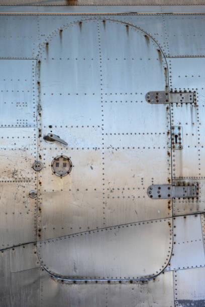 istock Old Aircraft Metal Covering tiles Texture 1257957698