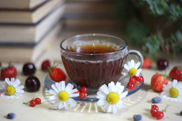 herbal tea - flower cherry cup tea imagens e fotografias de stock