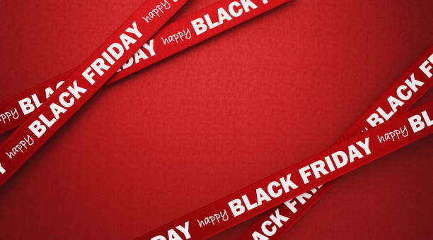 Happy Black Friday Written Red Ribbons over Red Background Happy Black Friday written red ribbons over red background. Horizontal composition with copy space.  Black Friday concept. black friday sale banner stock pictures, royalty-free photos & images