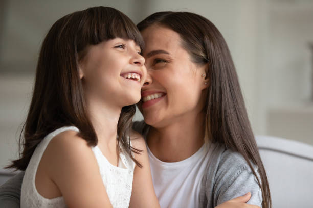 istock Happy young mom have fun playing with small daughter 1257964381