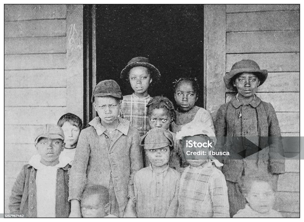 Antique black and white photo: Group of children in Southern USA African-American Ethnicity stock illustration